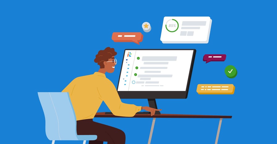 man sitting behind desk using an onboarding program